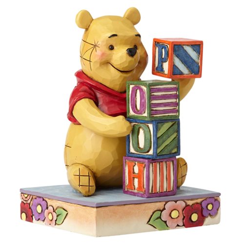 Disney Traditions Winnie the Pooh with Baby Blocks Statue